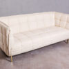 White quilted Kri sofa with gold legs