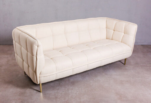 White quilted Kri sofa with gold legs